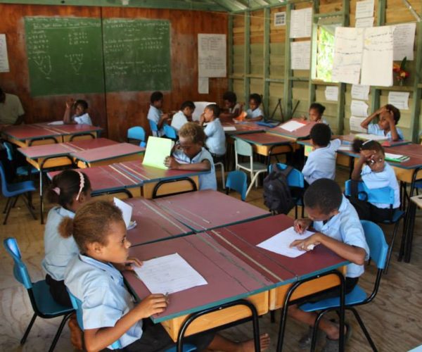 Education In Vanuatu Is Enhanced With The Donation Of These Desks And Chairs From New Zealand